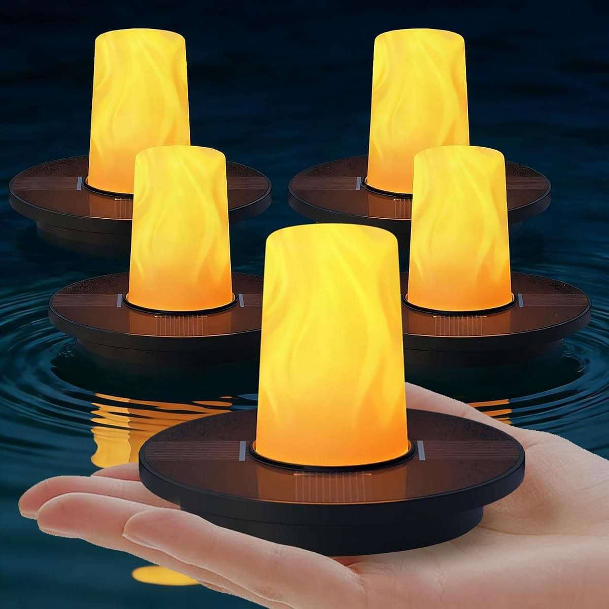 Five solar floats with tall flame-shaped lights against a dark ground